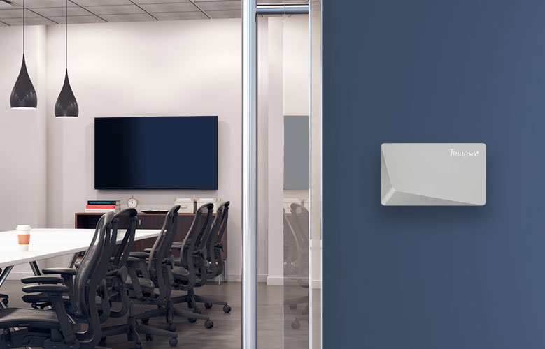 Thingsee AIR sensor mounted on an office wall