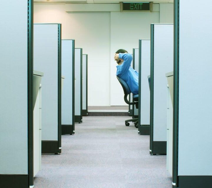 man in a smart office cubicle