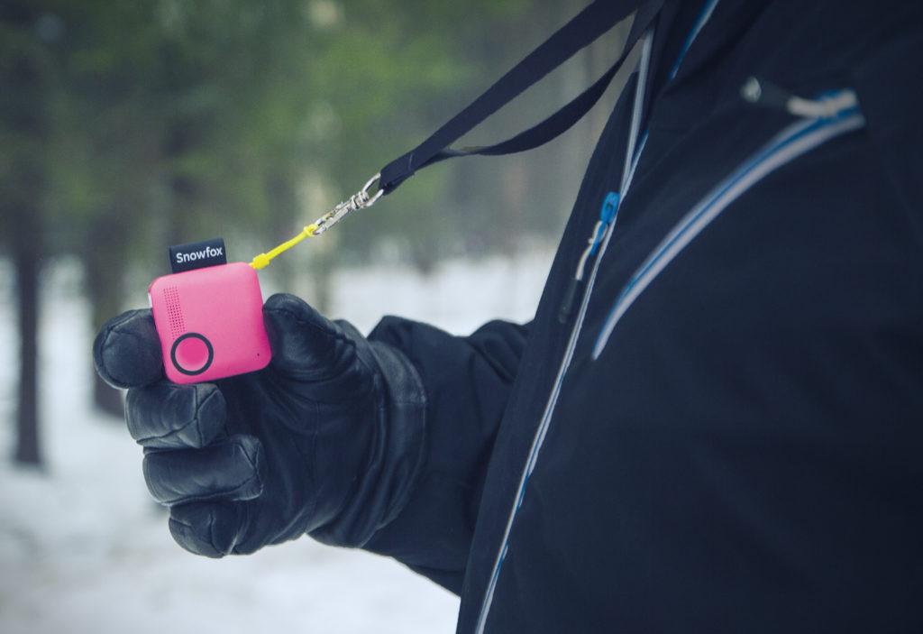 Magenta Snowfox Trackerphone in hand