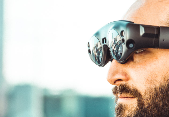 man wearing smart glasses which are one of the product trends