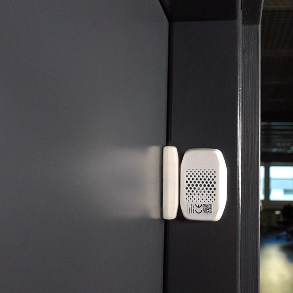 Thingsee ENVIRONMENT IoT device installed on a door frame
