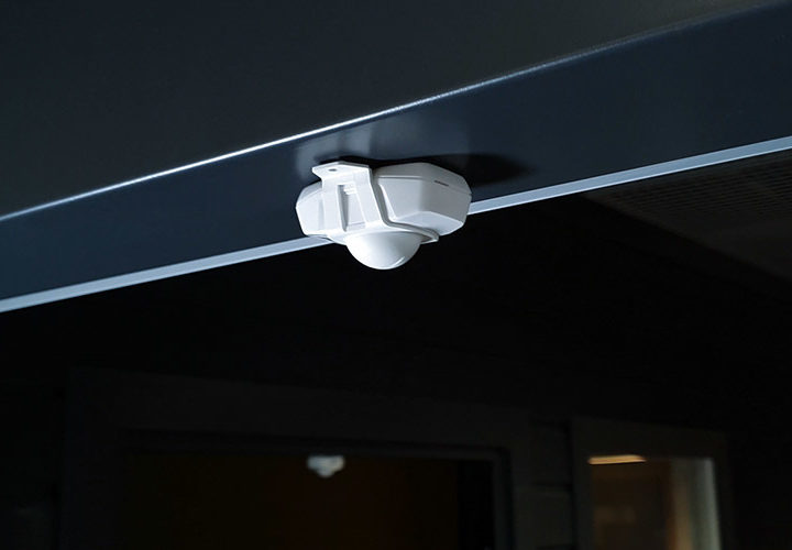 Thingsee PRESENCE IoT device installed above a doorway for visitor counting