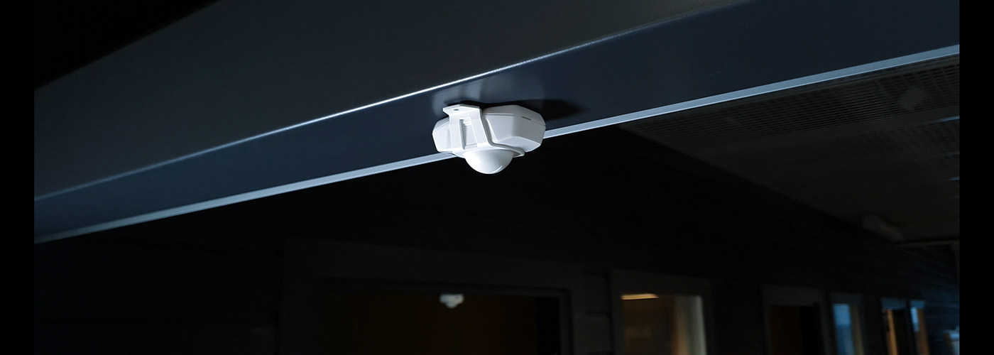 Thingsee PRESENCE IoT device installed above a doorway for visitor counting