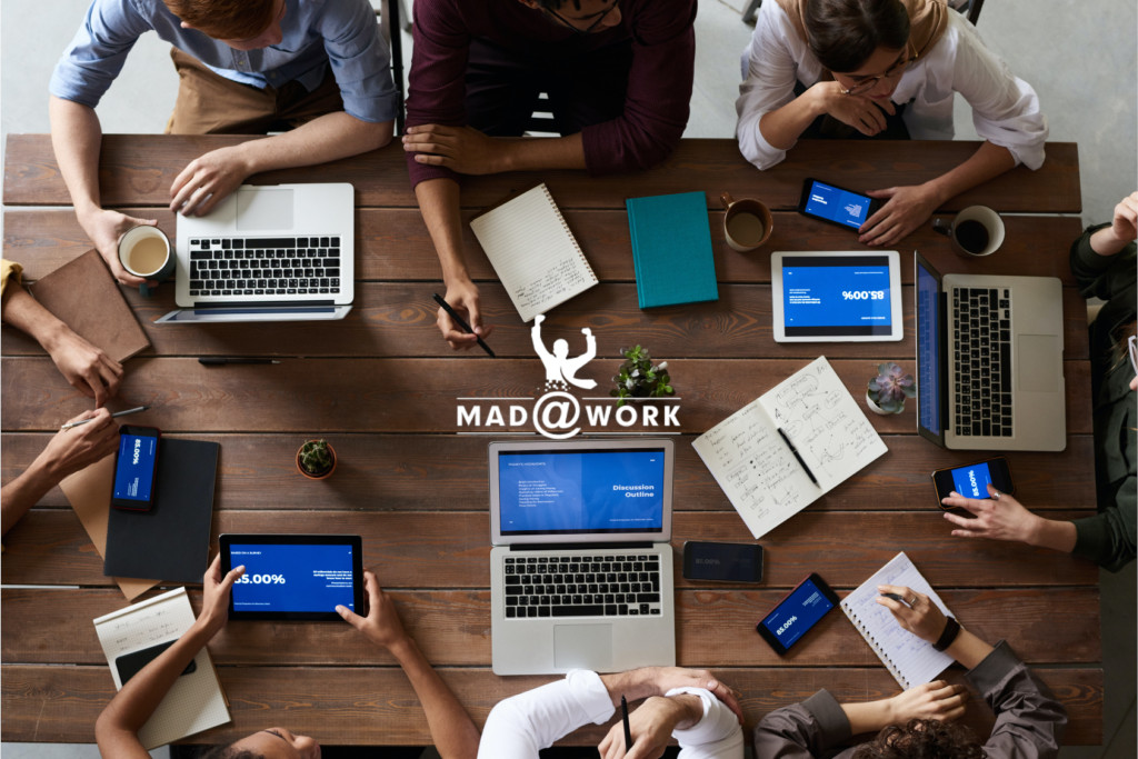 Mad at work header image with people working on the project