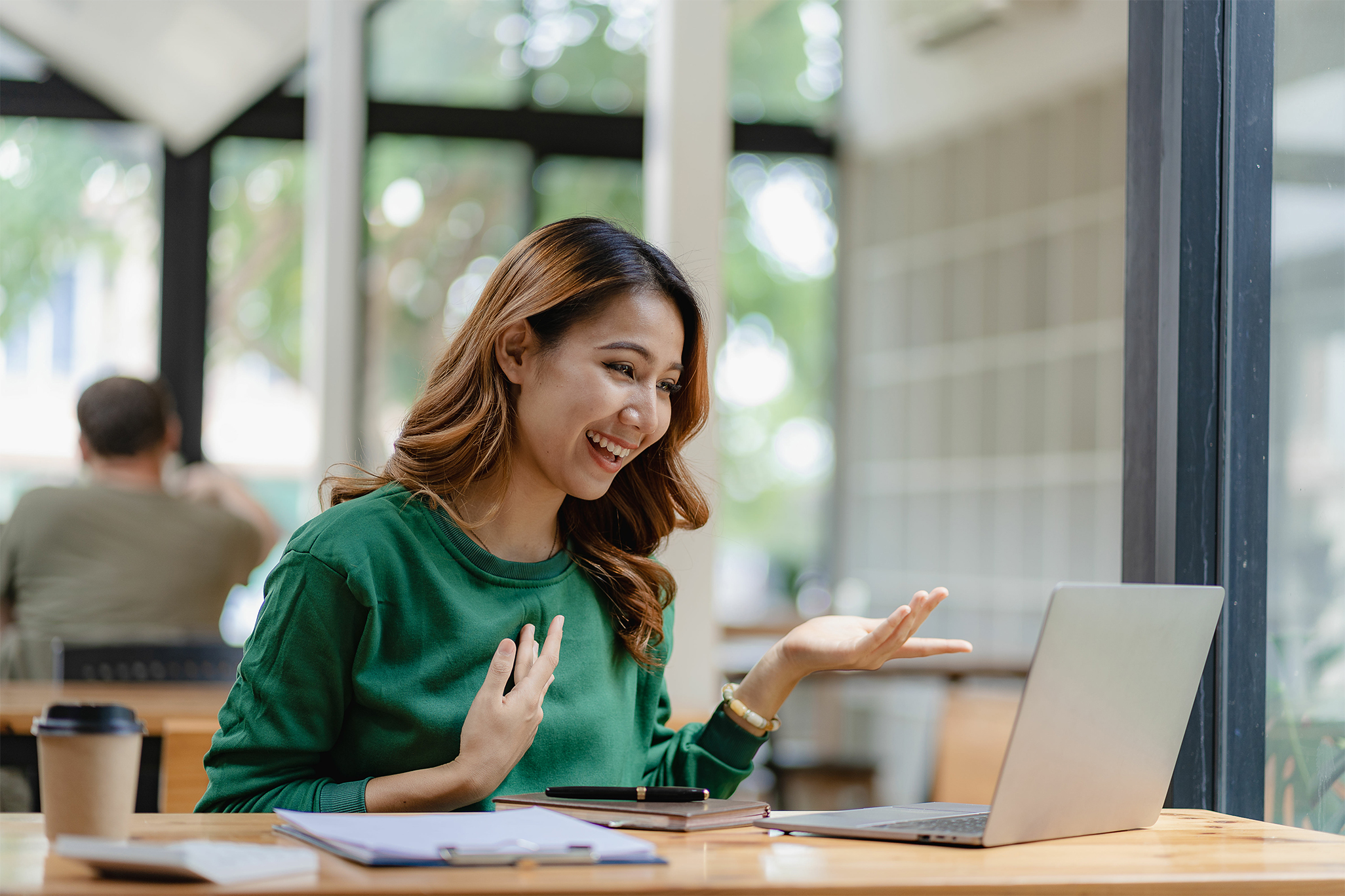 A woman centrally monitoring remote building assets