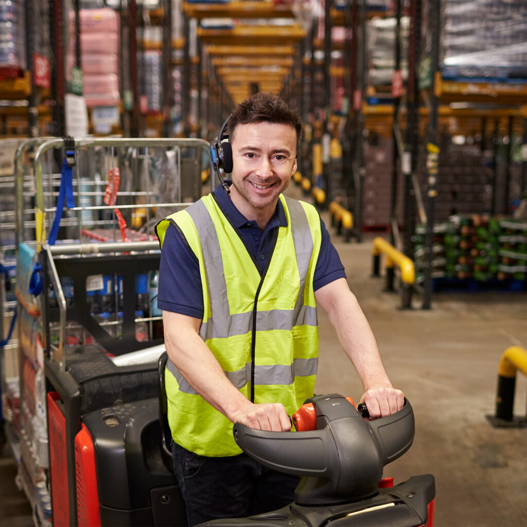 Man on a machine improving intralogistics efficiency