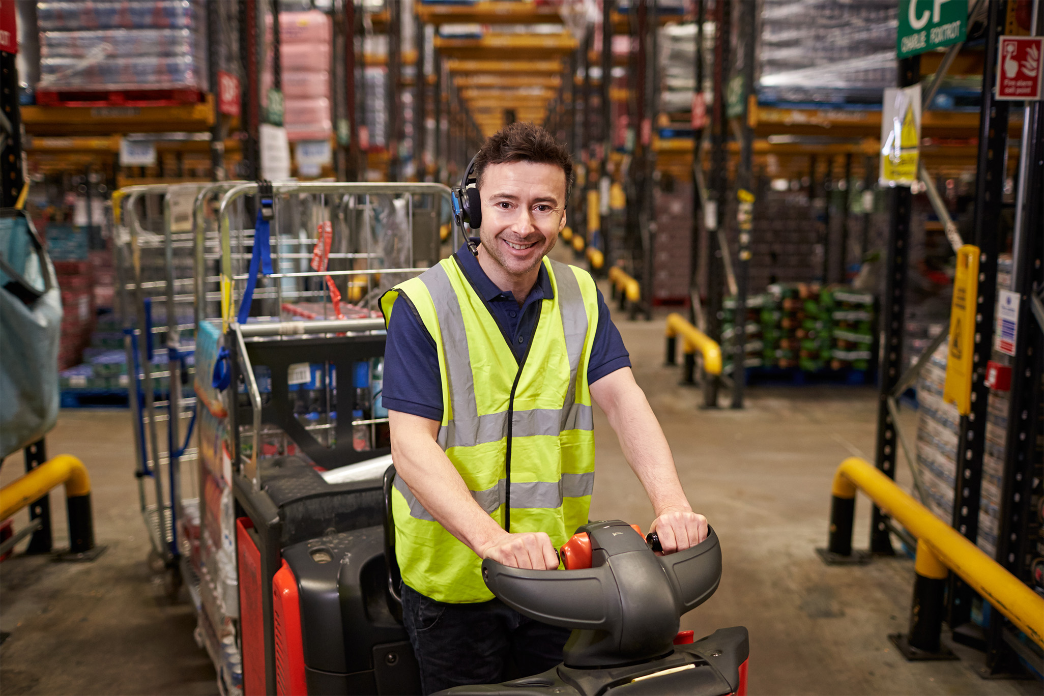 Man on a machine improving intralogistics efficiency